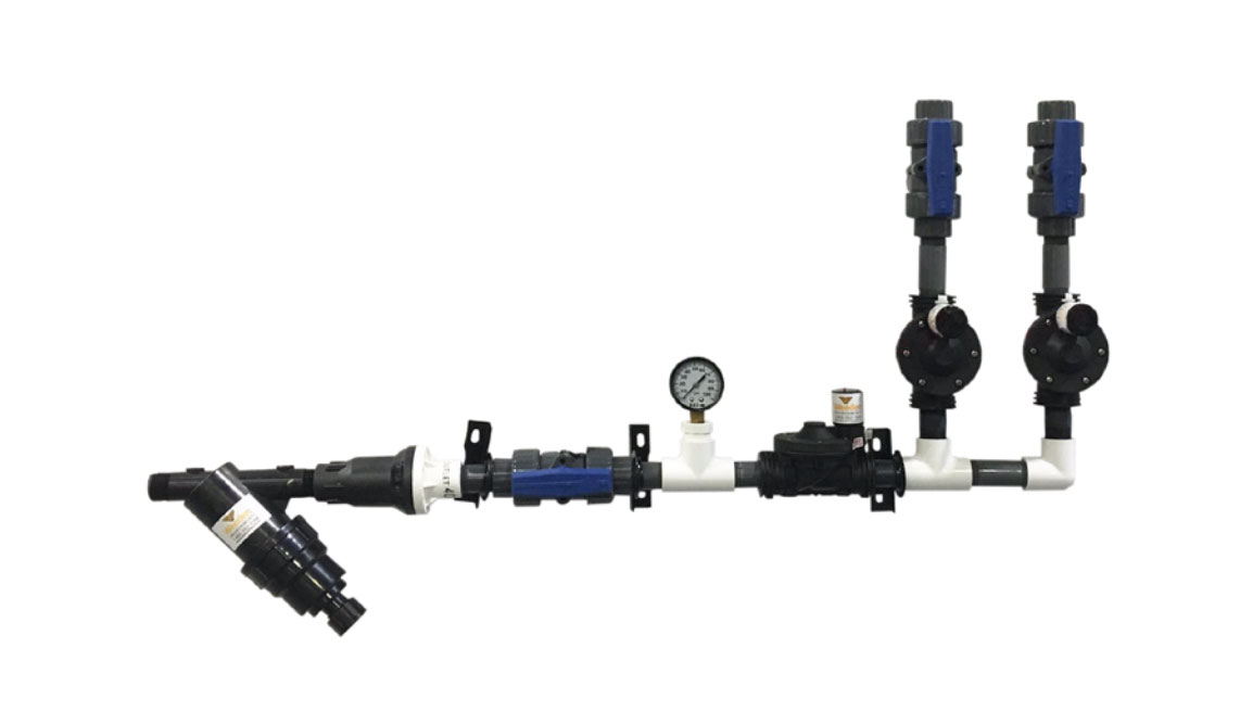 The poultry sprinkler system distributes water through the building from a centralized manifold system, available with 2 or 4 valves depending on installation size.
